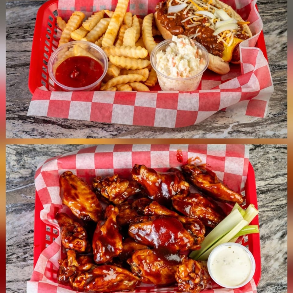 A chili dog with fries and coleslaw, and a basket of BBQ wings with celery and ranch.